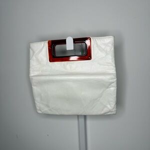 Vintage leather clutch with brown resin handle